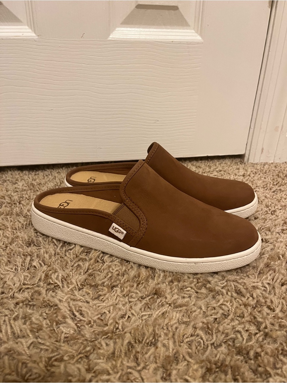 UGG women’s Brown Leather Slip-On Mules
